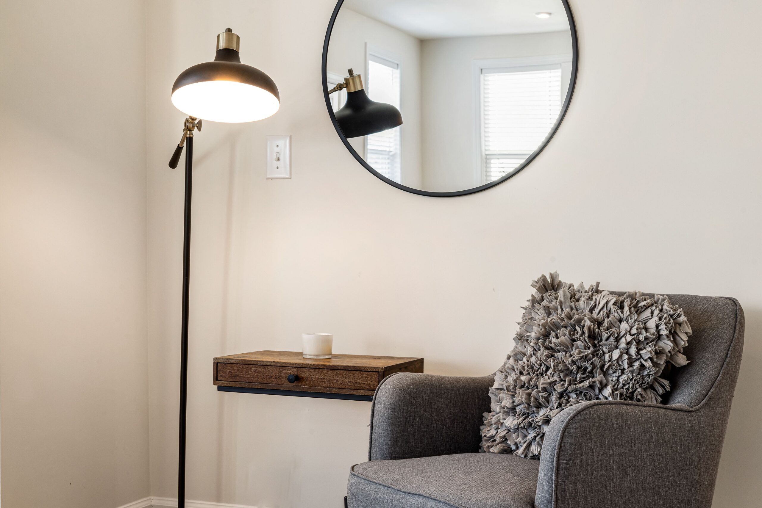 Inside the Mix 1 A lived-in rental corner, warm and styled — not a showroom.